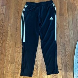 Mens Adidas joggers,  black with white side stripes,  drawstring, zip at ankles